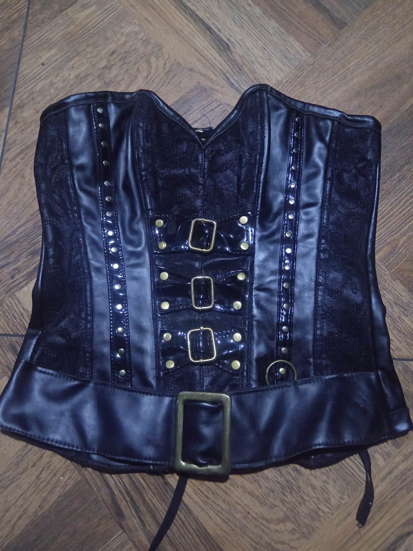 Corsé estilo steampunk en color negro con detalles en cuero - foto 1